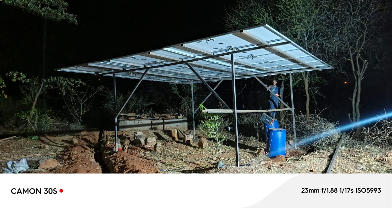 Solar structure installation at night